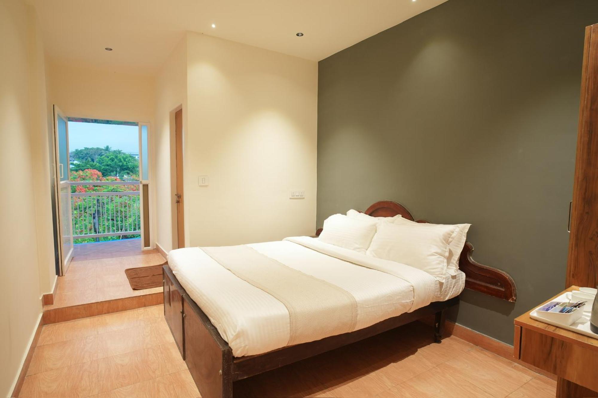 Rasha Residency Hostel Kalpatta Buitenkant foto