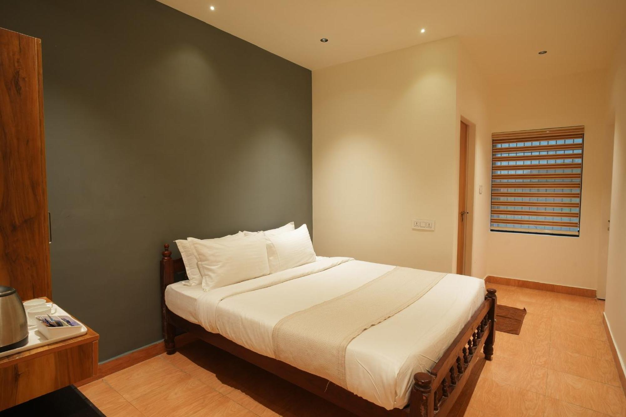 Rasha Residency Hostel Kalpatta Buitenkant foto