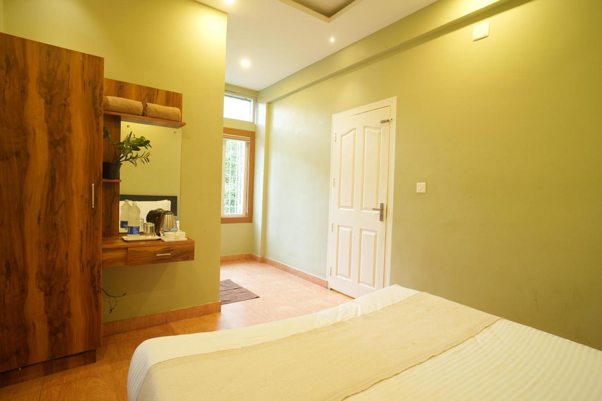 Rasha Residency Hostel Kalpatta Buitenkant foto
